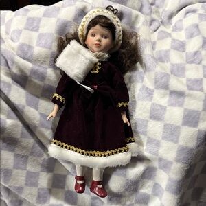 Charming Doll in Deep Purple Dress with White Accessories